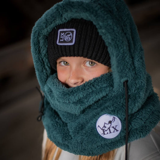 Hooder passe-montagne de couleur bleu vert pour enfant avec cache-cou intégré. Collection roadtrip. Rider hood de couleur bleu avec cache-cou. Rider hood Lix.