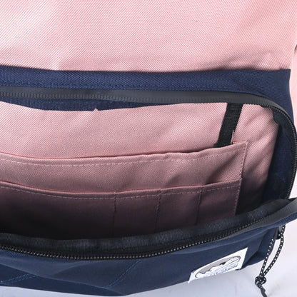 Sac a dos rose avec rangement conçu au Québec par LIX.