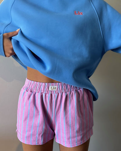 Short rose en coton conçu par lix un entreprise Québécoise pour les femme qui aiment les voyages et les roadtrip. 