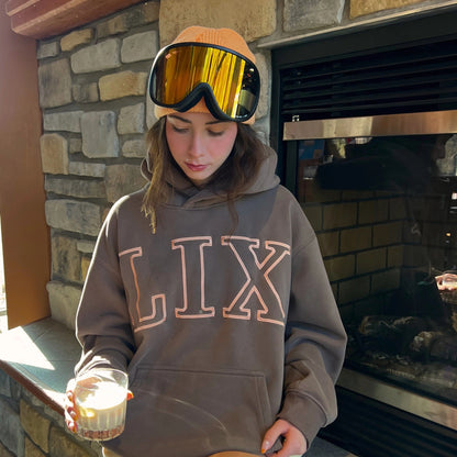 Hoodie lix brun avec grosse broderie lix au devant de couleur or rose. 