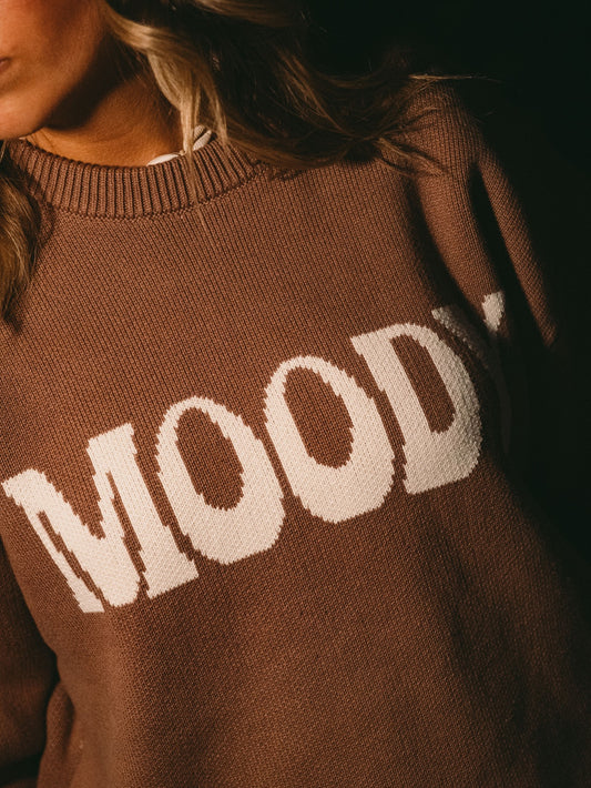 Tricot épais brun inscription moody beige crème. Lix